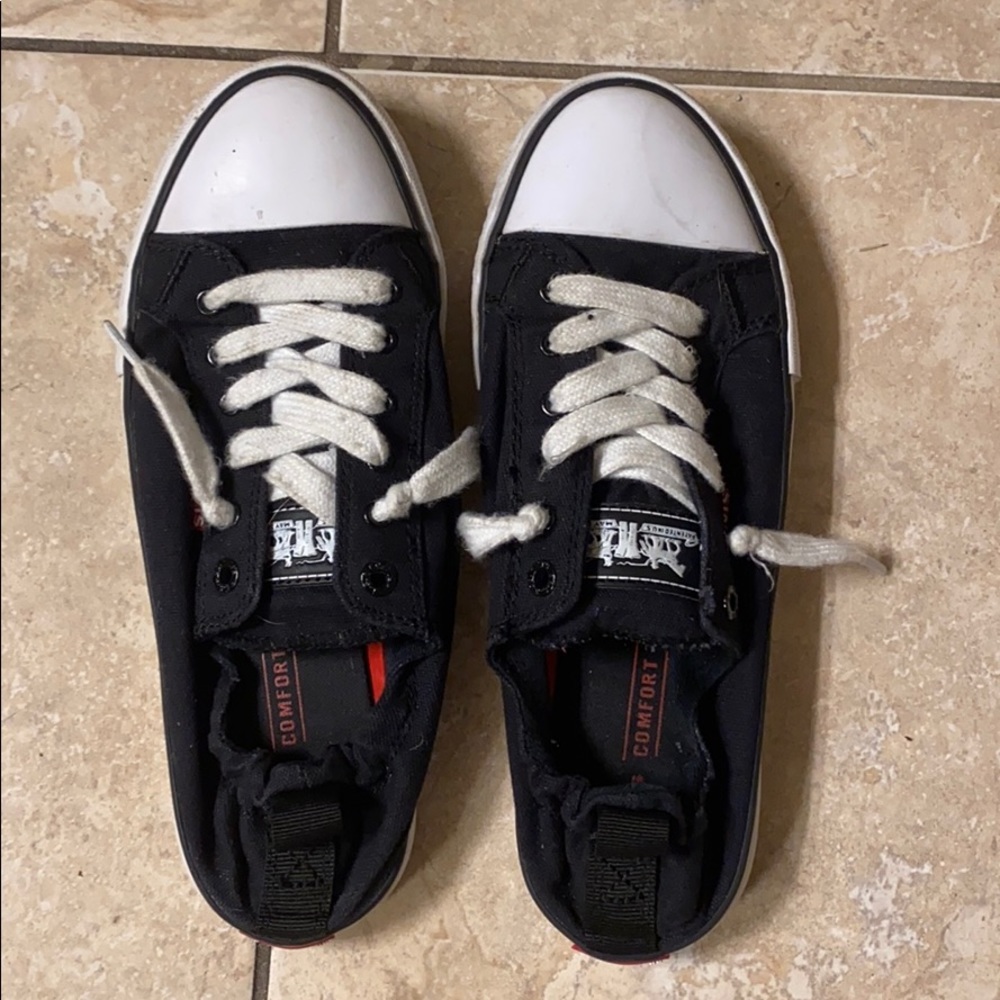 Levi’s (converse style) tennis shoes.
